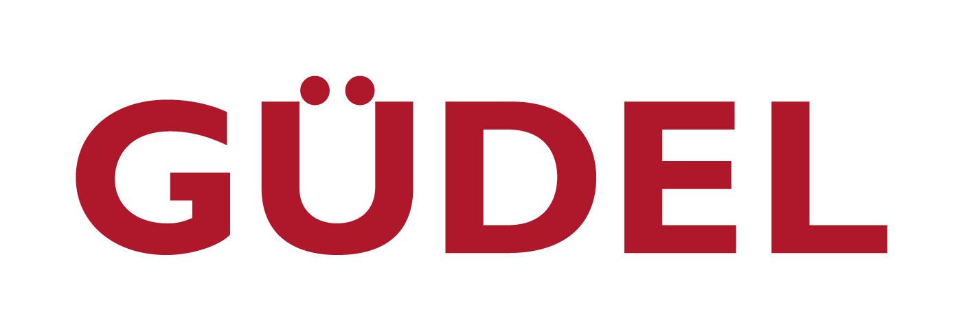 Güdel written in red large letters.